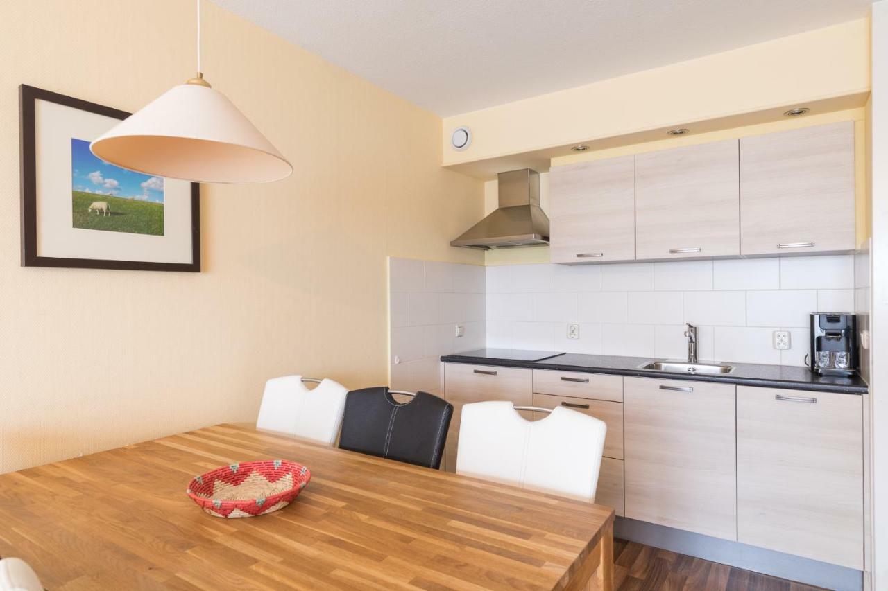 Appartement De Vrijbuiter, Resort Amelander Kaap 霍勒姆 外观 照片