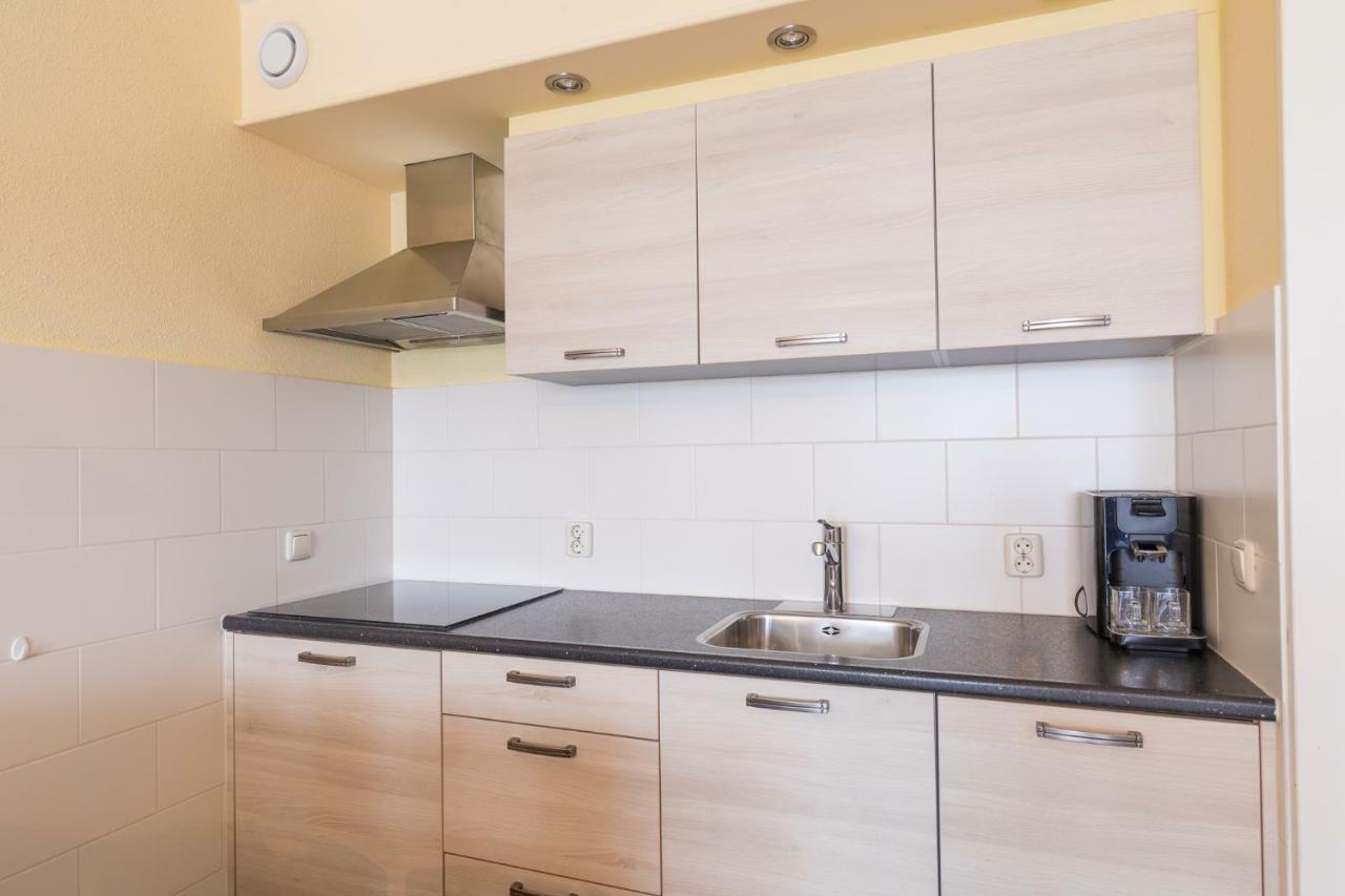 Appartement De Vrijbuiter, Resort Amelander Kaap 霍勒姆 外观 照片